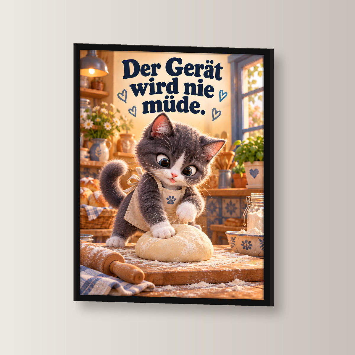 Teigknetmeister – Gerahmtes Katzenbild. Spruch: Der Gerät wird nie müde. Schwarzer Rahmen ohne Passepartout. 2 WINKEL. 30×40 cm.