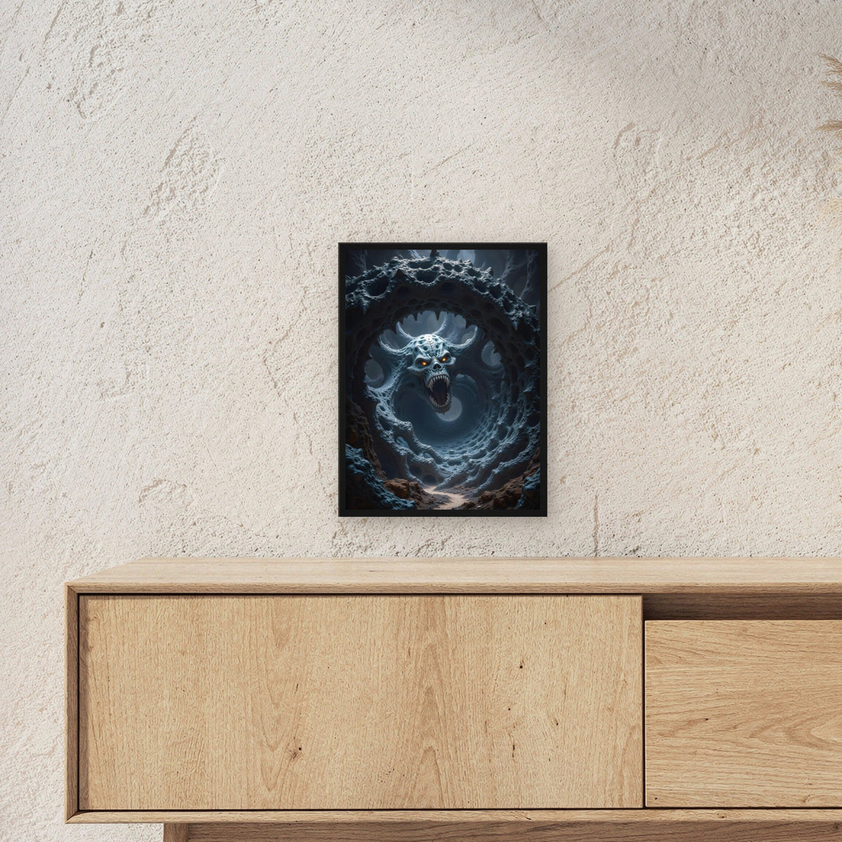 Schädel im Rachen eines lebenden Höhlensystems, Surreales Wandbild gerahmt im schwarzen Holzrahmen ueber einem Sideboard, zeigt die Groesse im Raum