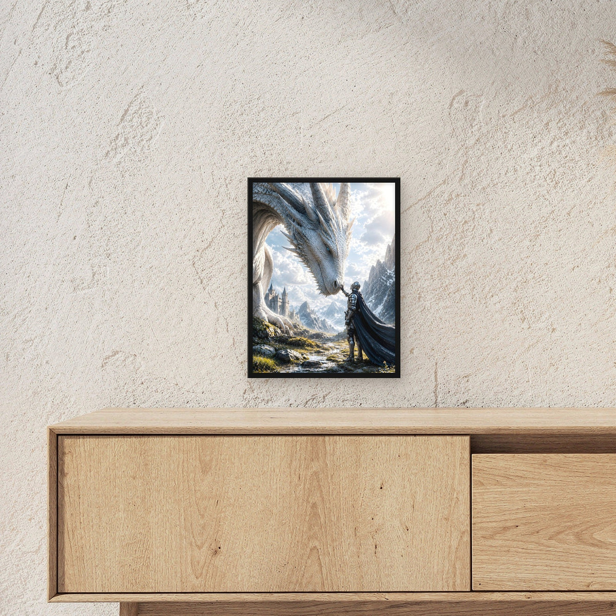 Ritter berührt den weißen Drachen, Fantasy Wandbild gerahmt im schwarzen Holzrahmen ueber einem Sideboard, zeigt die Groesse im Raum