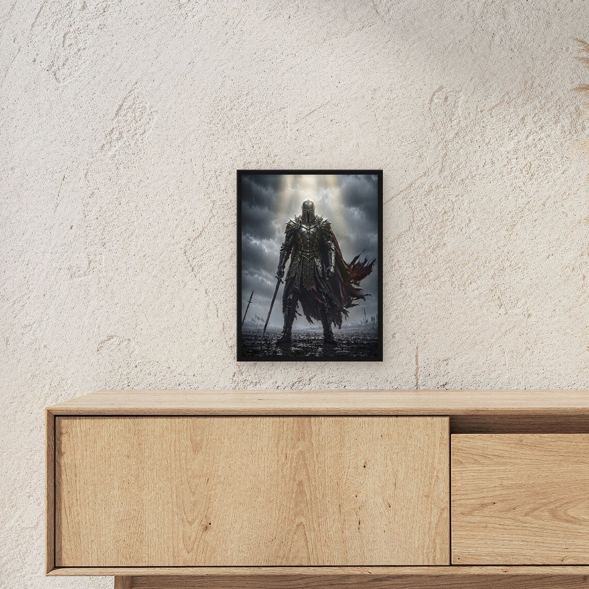 Ritter im Lichtstrahl über dem Schlachtfeld, Mittelalter Fantasy Wandbild gerahmt im schwarzen Holzrahmen ueber einem Sideboard, zeigt die Groesse im Raum