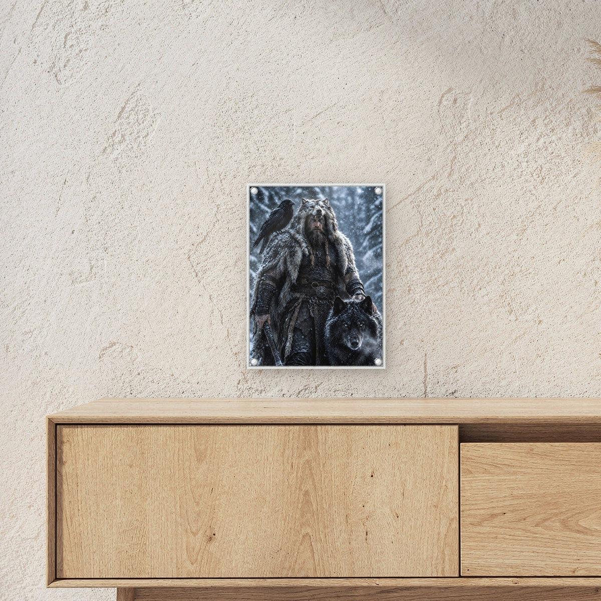 Wikinger mit Wolf und Rabe im verschneiten Wald, Dark Fantasy Acrylglasbild auf Acrylglas mit Edelstahl-Abstandshaltern ueber einem Sideboard, zeigt die Groesse im Raum