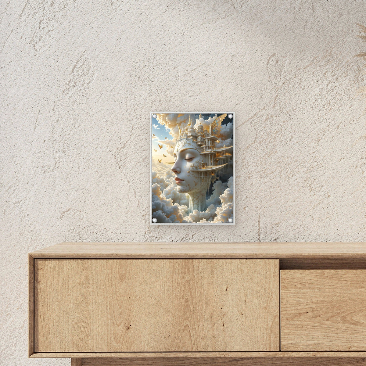 Weiß-goldene Stadt als Gesicht in den Wolken, Surreales Acrylglasbild auf Acrylglas mit Edelstahl-Abstandshaltern ueber einem Sideboard, zeigt die Groesse im Raum