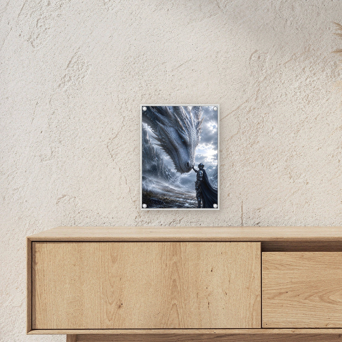 Ritter berührt die Schnauze des weißen Drachen, Dark Fantasy Acrylglasbild auf Acrylglas mit Edelstahl-Abstandshaltern ueber einem Sideboard, zeigt die Groesse im Raum